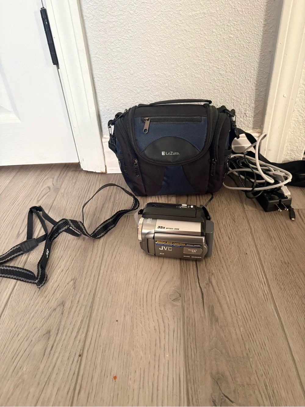 Silver Compact Camcorder with Blue LeZura Carry Case